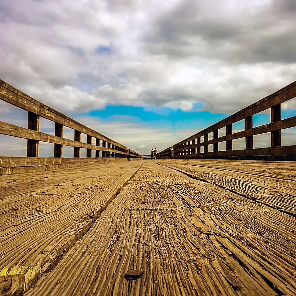 low-angle photography of wooden bridge pathway HD wallpaper