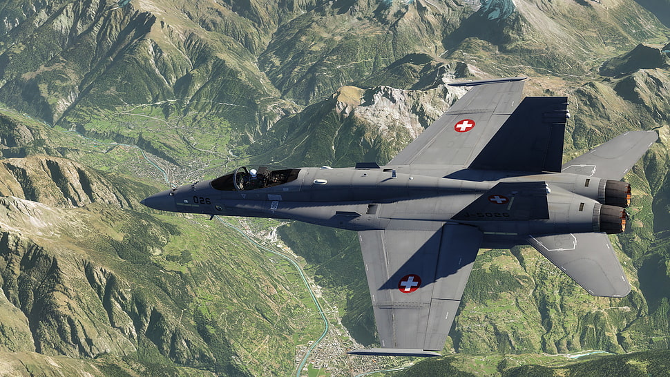 black jet plane above rock formation HD wallpaper