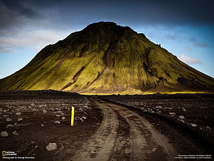 brown and black wooden bed frame, Iceland, mountains, dirt road, landscape