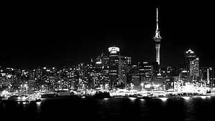 grayscale photography of cityscape near body of water, monochrome, cityscape, night, lights HD wallpaper