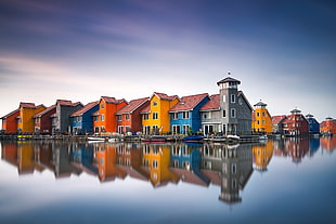 assorted-color concrete houses, water, reflection, house, colorful
