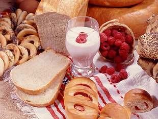 photo of slice bread beside milk and berries