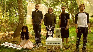 pictorial of music band artists in forest