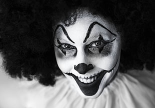 black and white photograph of clown