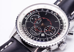 closeup photo of black chronograph watch