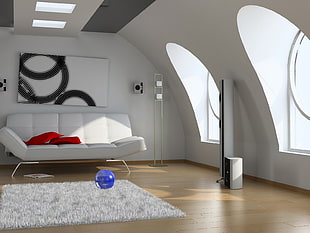 white leather sofa bed near white fur area rug