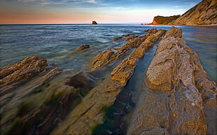 brown rocks, landscape, water, rocks, sky HD wallpaper