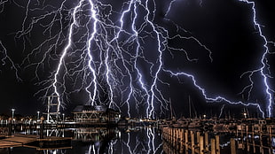 lightning strike, dock, ship, water, night HD wallpaper