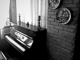 black and white wooden dresser with mirror, piano, music