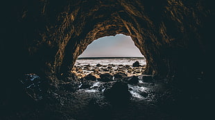 brown stones, cave, sea, rock HD wallpaper