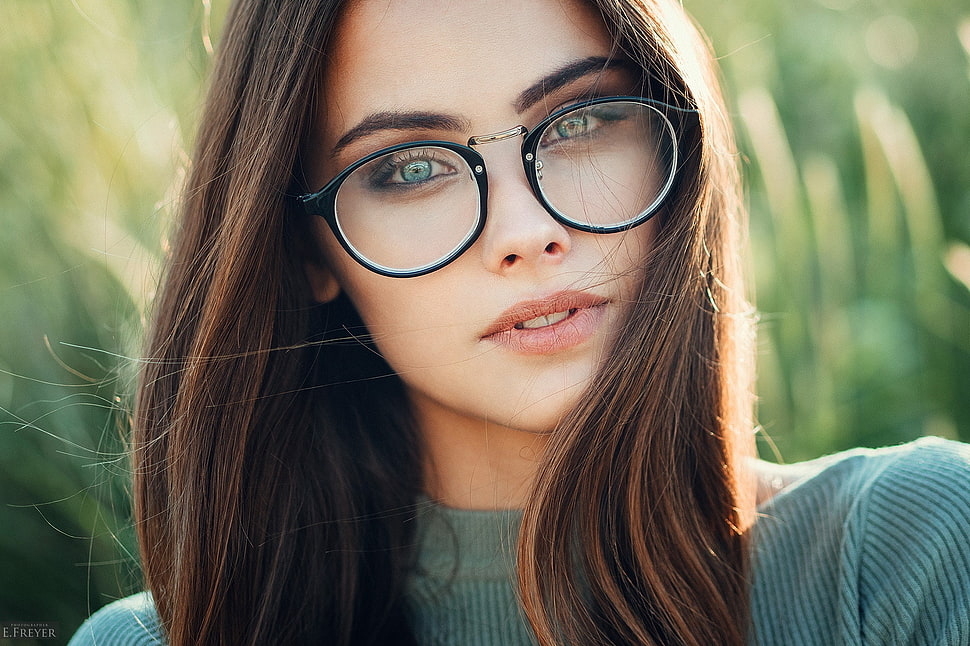 woman wearing black-frame eyeglasses HD wallpaper