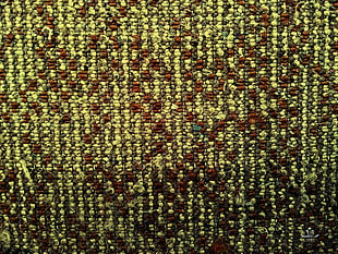 yellow and brown knit textile