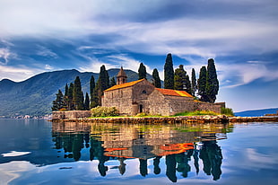 brown concrete house surround by body of water, architecture, old building, ancient, Montenegro