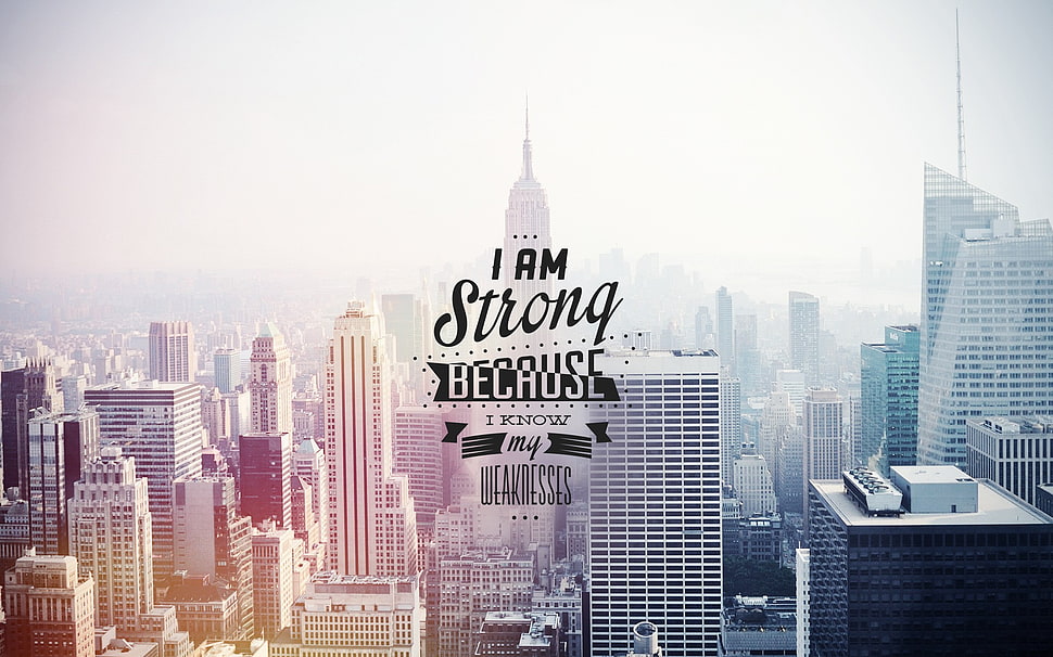 I am strong because i know my weaknesses text overlay on Empire State background HD wallpaper