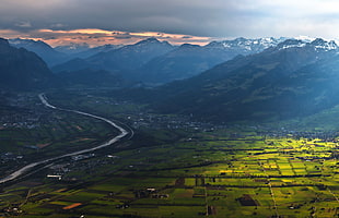 high angle photo of mountain range near river HD wallpaper