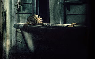 woman in gray bathtub illustration