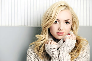 closeup photo of blonde woman in knit sweater