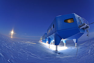 gray steel cabin on ice