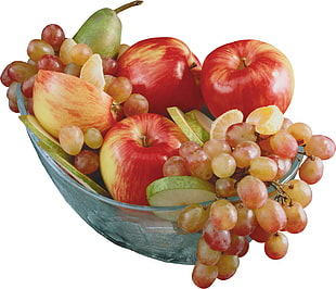red apples, and yellow grape fruits in clear glass bowl