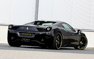 black Ferrari sports coupe