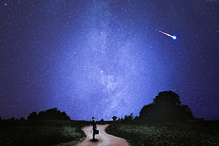 man watching meteor falling from sky HD wallpaper