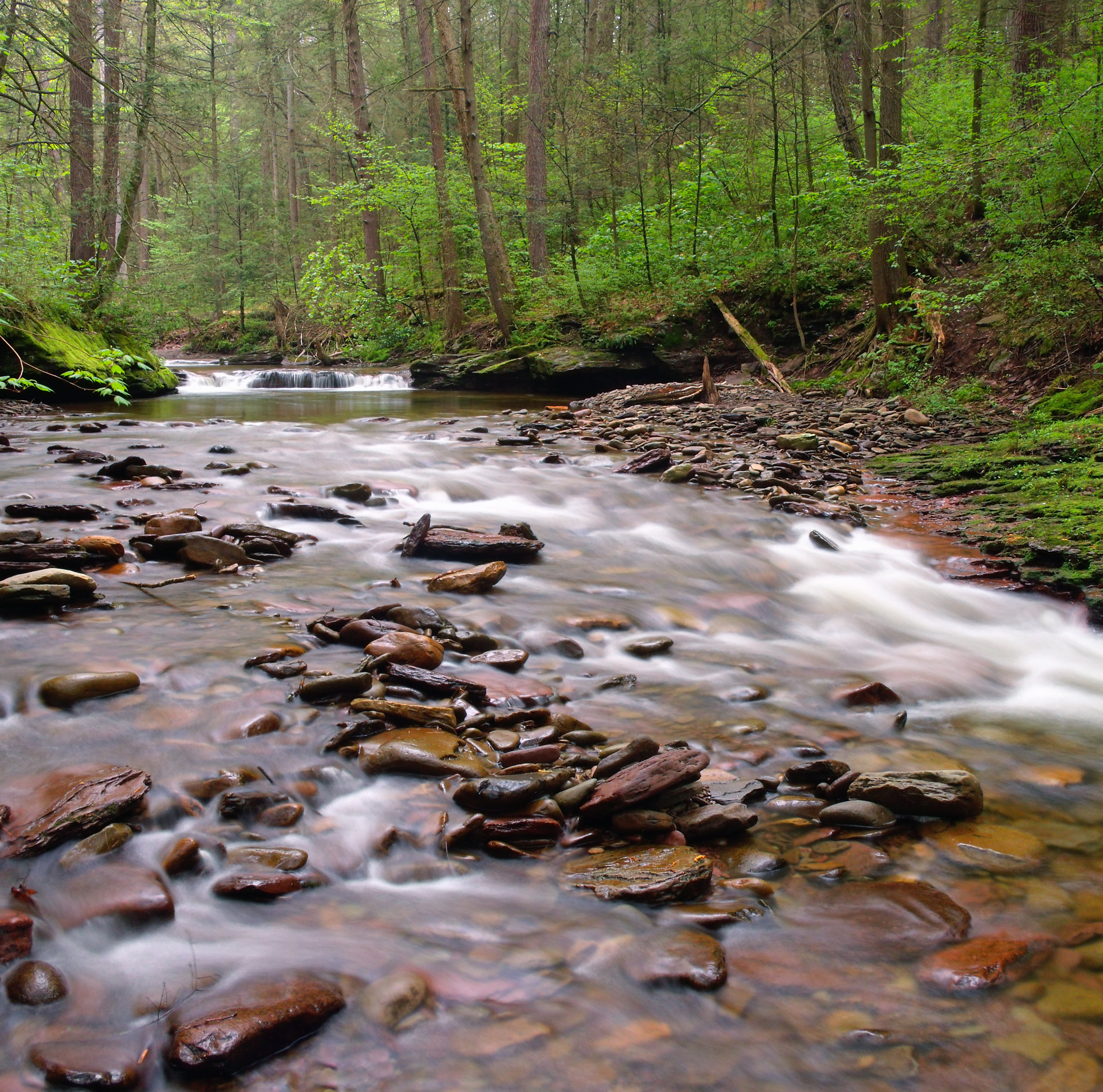 Clear Body Of Water With Rocks During Daytime Hd Wallpaper Wallpaper