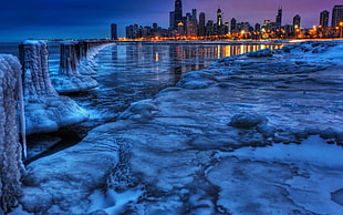 body of water and city buildings, cityscape, ice, water