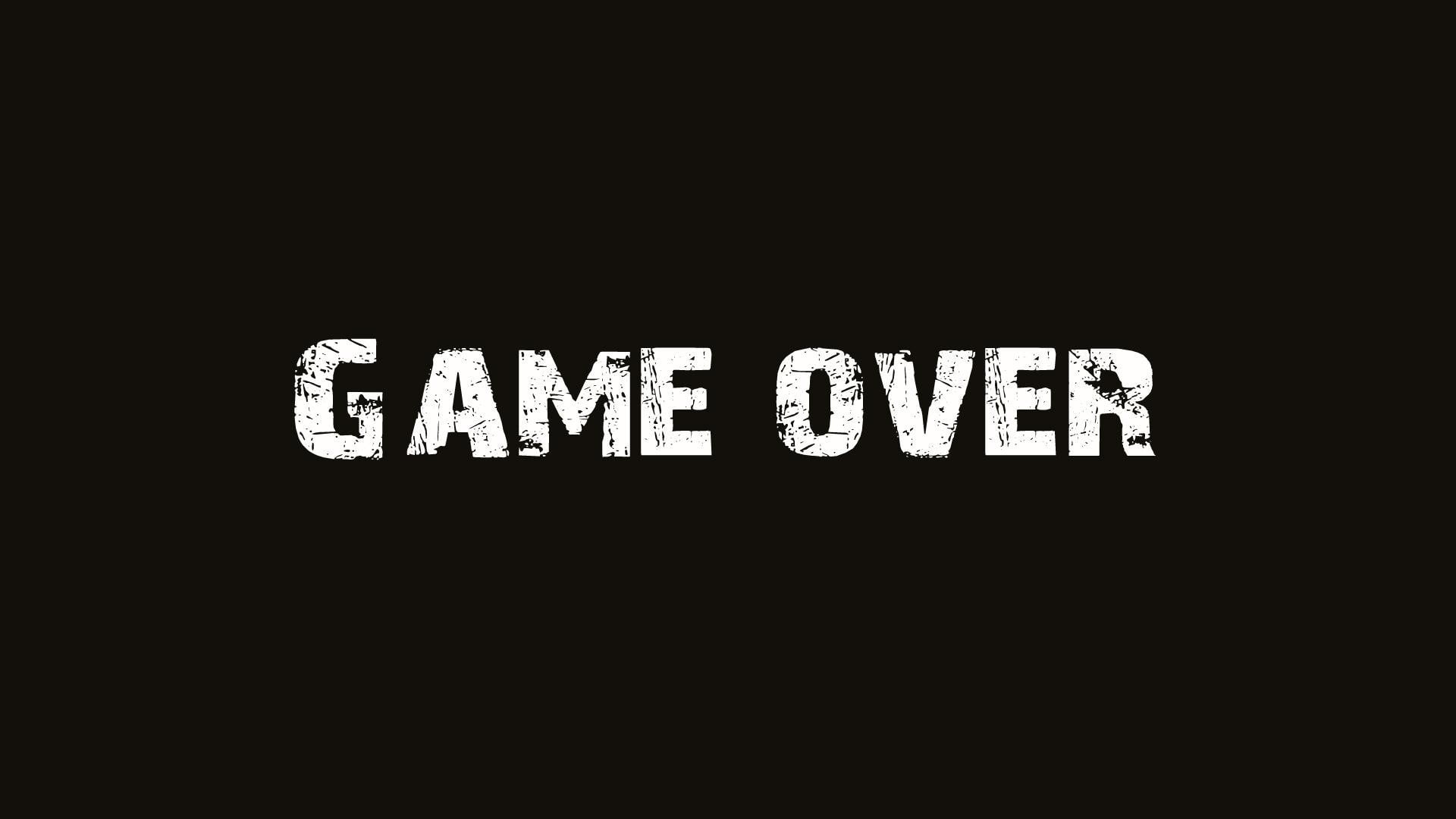 black background with game over text overlay, typo, minimalism, GAME OVER, video games