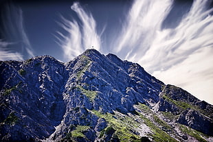 landscape photography of mountain under cirrus clouds