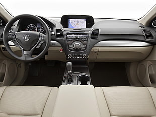 photography of gray and black Acura vehicle interior