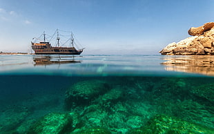 brown galleon ship, sea, ship, rock, split view