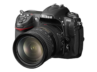 black Nikon D300 DSLR camera with telephoto lens