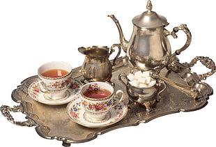 brass teapot set with two ceramic teacups