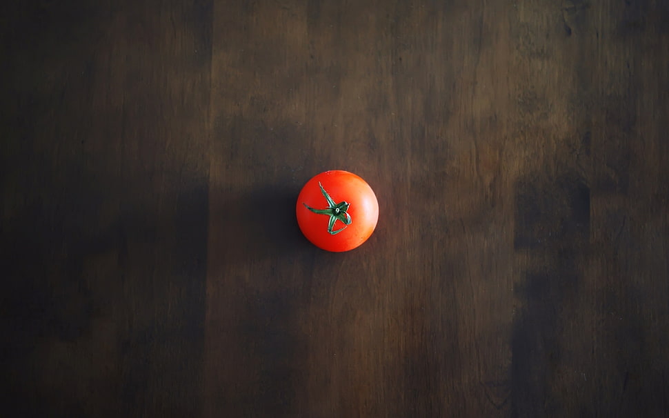 red tomato on brown surface HD wallpaper