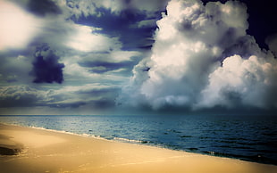 time lapse photography of body of water near seashore