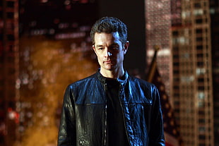 man in black leather full-zip jacket