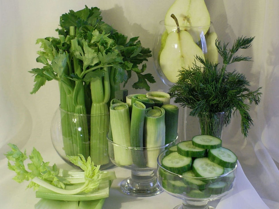 sliced green leaf vegetables and sliced cucumber on three clear glass bowls place on white table HD wallpaper