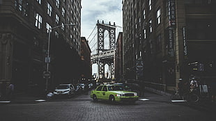 green sedan, cityscape, photography