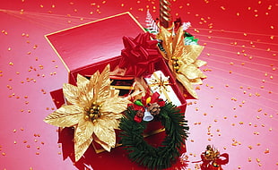 assorted gifts on red surface