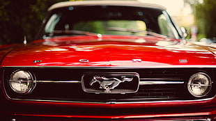 closeup photography of red Ford Mustang