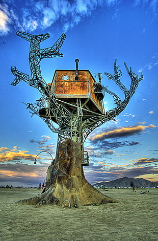 brown tree house illustration, steampunk, metal, Burning Man, desert