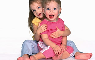 photo of two girls wearing pajama