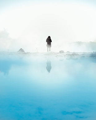 person standing with reflection on water wallpaper, photography, mist, reflection, water