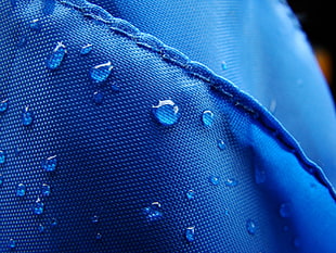 blue textile with morning dew