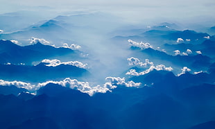 landscape photo of mountain top with clouds