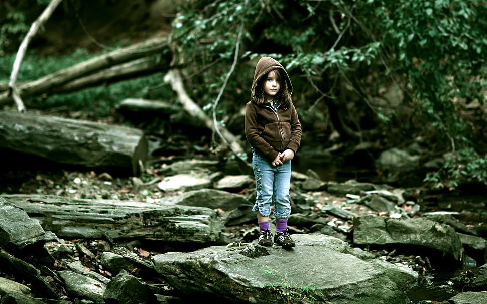 girl standing on stone near tree HD wallpaper