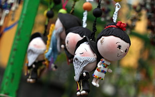 black haired doll keychain HD wallpaper