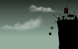 silhouette of animals on the cliff