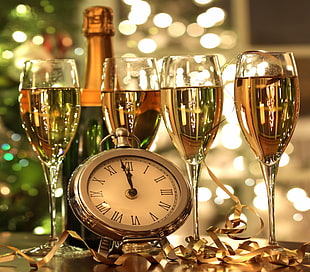 four filled liquors in clear glass champagne glasses HD wallpaper