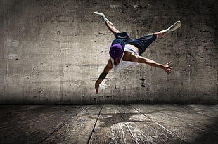man dancing with gray background